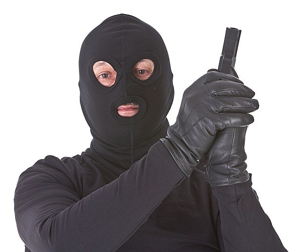 robberwithagun_iStockphoto_ robber with gun